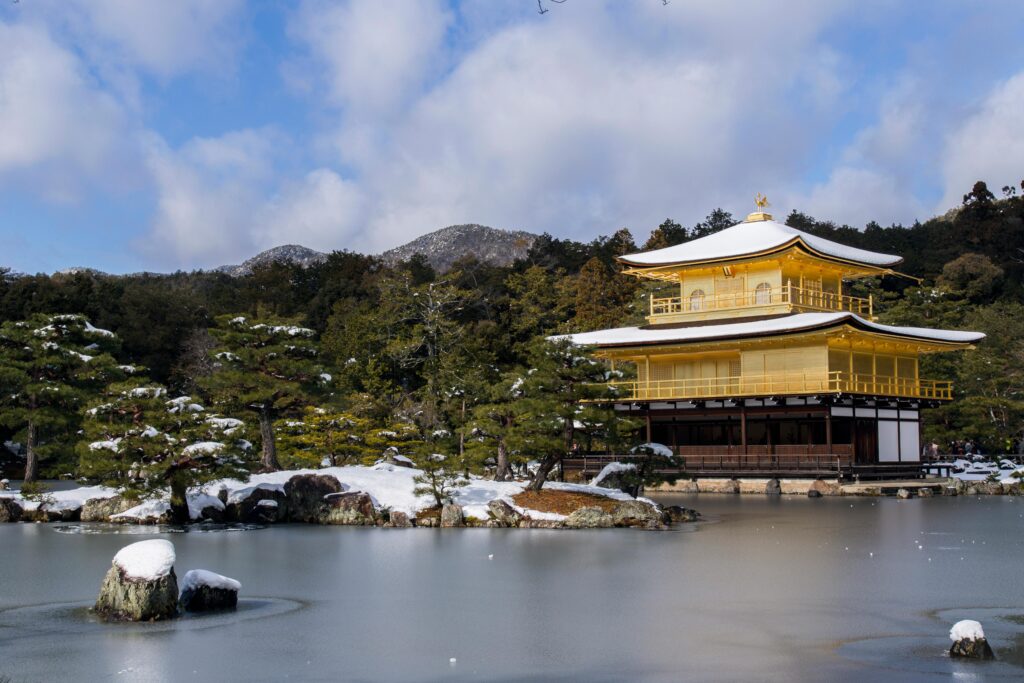 Kinkaku-ji Temple in Kyoto, Japan covered in snow, a serene winter travel destination for exploring Japan’s cultural heritage.