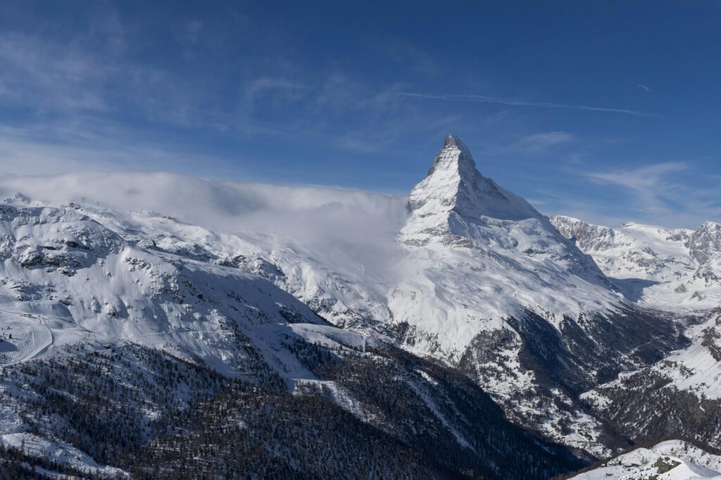 Stunning view of the snow-covered Matterhorn, a top choice for winter travel destinations in Switzerland, offering incredible skiing experiences and winter adventures.