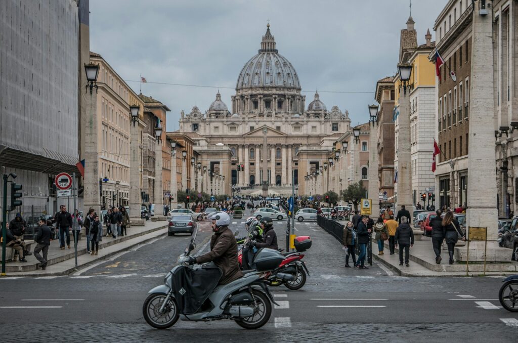 Busy street leading to St. Peter’s Basilica in Rome, featured in this Rome travel guide.