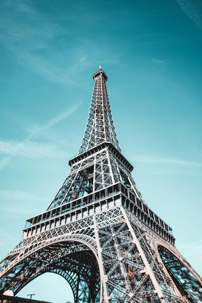 Close-up of the Eiffel Tower, an iconic attraction featured in this Paris travel guide.